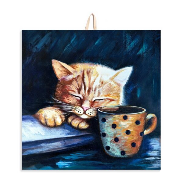 Ceramic tile painting of a ginger cat sleeping beside a polka-dot mug, with cork backing for safe wall hanging.