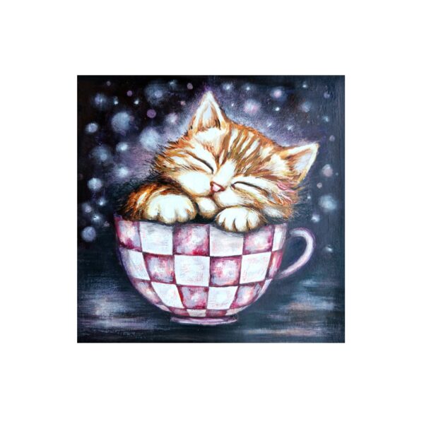 Magnet showing a ginger kitten sleeping peacefully inside a pink-and-white checkered teacup on a dark dreamy background.
