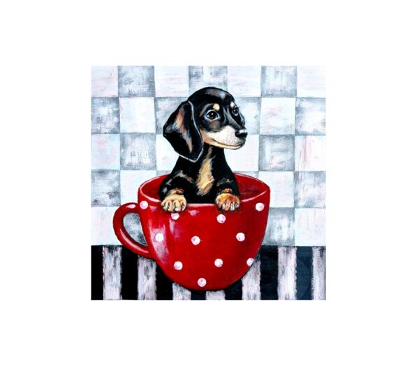 Magnet showing a dachshund puppy sitting inside a red teacup with white polka dots against a checkered background.
