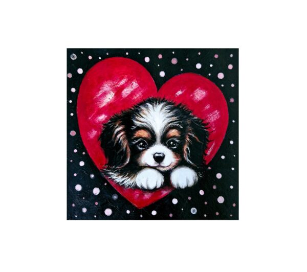Magnet showing a puppy resting inside a red heart on a black background with pink polka dots.