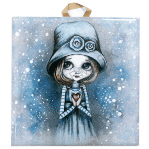 Ceramic tile painting of a girl in a blue hat and striped sleeves holding a red heart, with snowy background and cork backing for safe hanging.