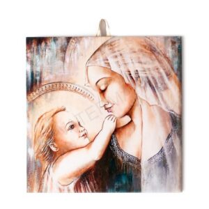Ceramic tile depicting the Virgin Mary holding the Child Jesus in a tender embrace, painted in soft, warm tones with a halo in the background.