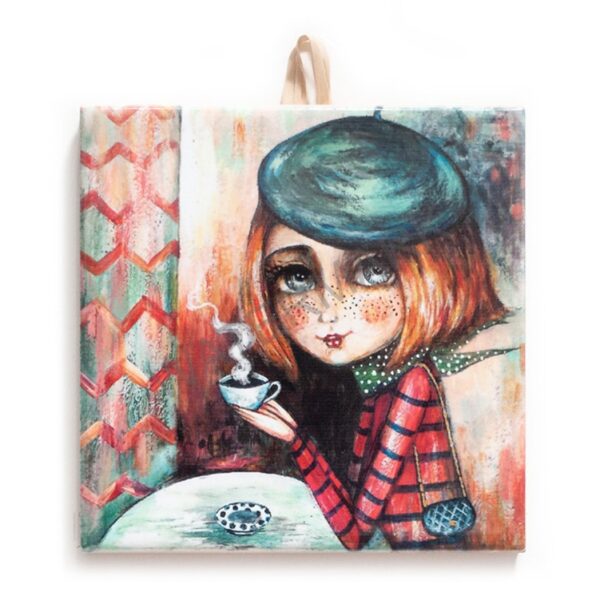 Colorful ceramic tile illustration of a whimsical girl with a beret and freckles, holding a steaming cup of coffee at a café table, set against a painterly background.