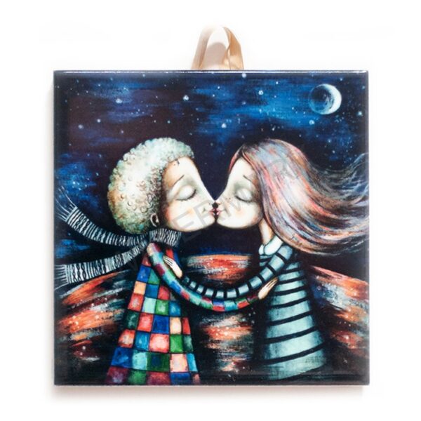 Ceramic tile featuring a romantic couple sharing a kiss at night under a starry sky with a crescent moon, wearing colorful patterned clothing.