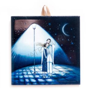 Ceramic tile artwork of two angels under a glowing streetlamp with a crescent moon above.