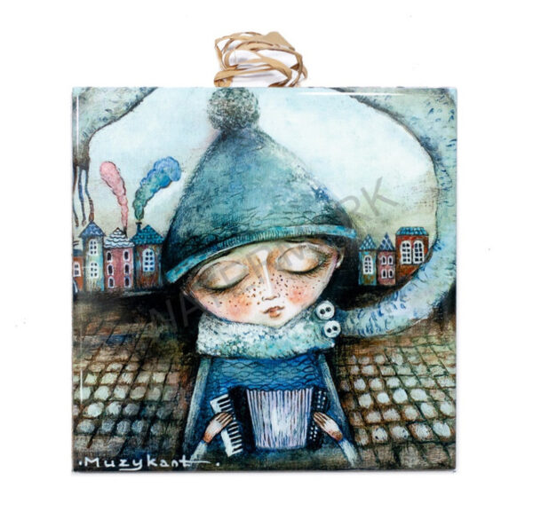 Ceramic tile artwork of a child in winter clothing playing the accordion with closed eyes, set against a whimsical city background.