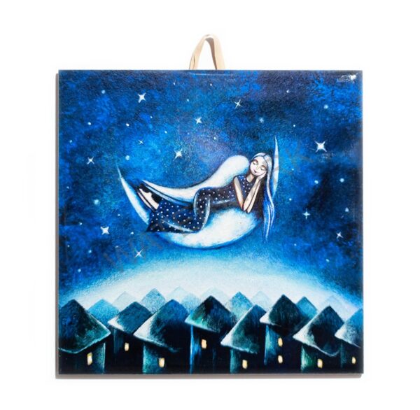 Ceramic tile featuring a dreamy illustration of a girl lying on a crescent moon above houses at night, surrounded by stars.