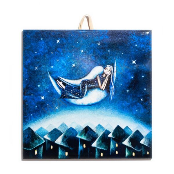 Ceramic tile featuring a dreamy illustration of a girl lying on a crescent moon above houses at night, surrounded by stars.