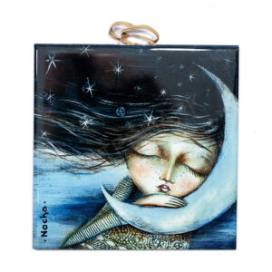 Ceramic tile with dreamy illustration of a girl resting on a crescent moon with flowing hair among stars in a night sky.