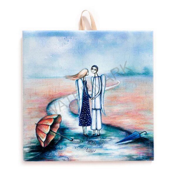 Ceramic tile with illustration of two angels holding hands on a winding path after rain, with puddles and two umbrellas in the foreground.